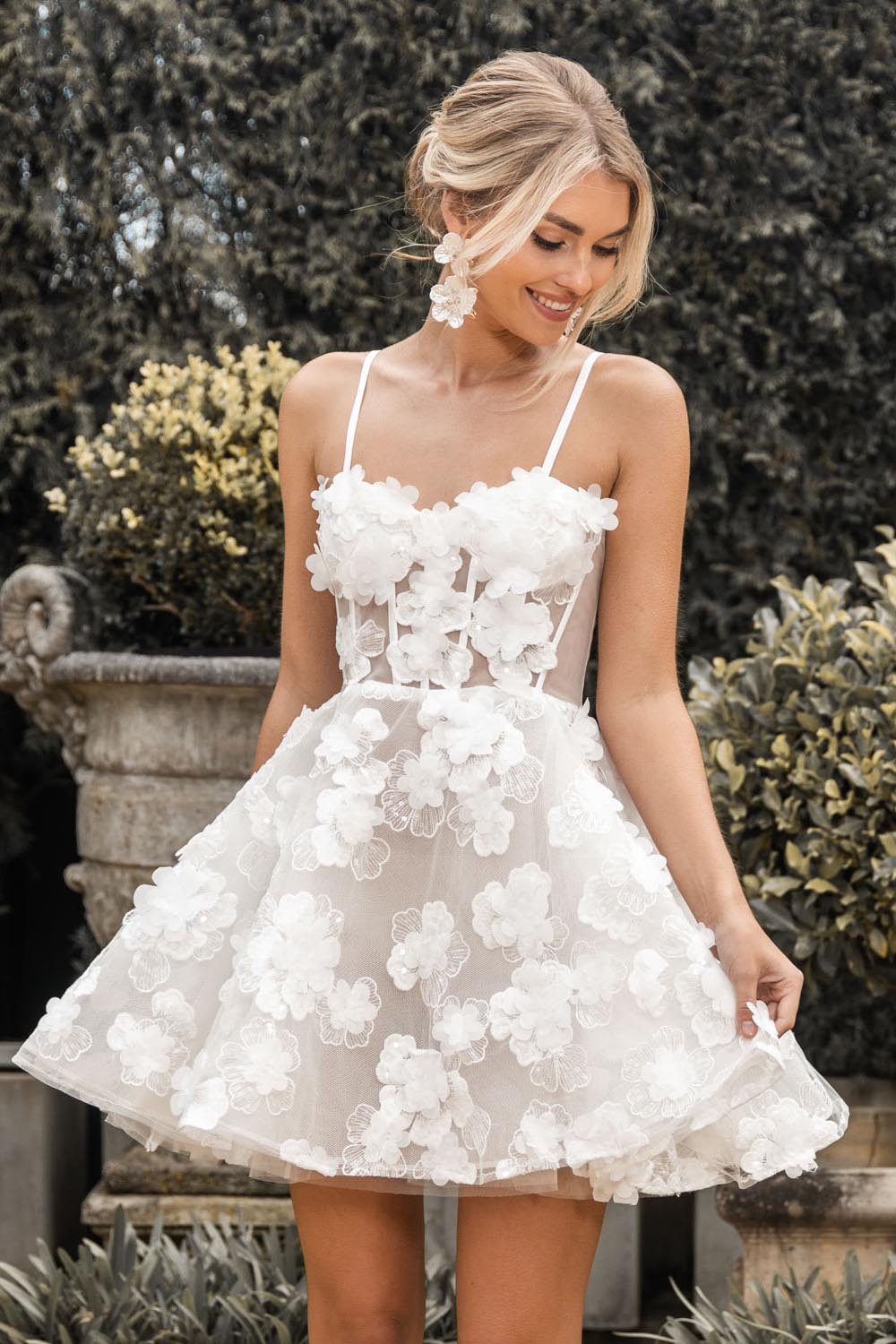 White Mini Dress featuring hand-sewn 3D flower appliques over flower lace, sheer corset bodice, layered tulle puffy skirt and thin shoulder straps