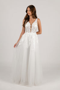 Ivory White A-line Wedding Gown with V Neckline adorned with Lace Appliques, Sheer Bodice and Full Voluminous Layered Tulle Skirt