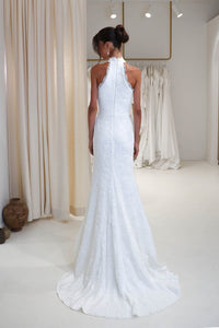 Back Image of Ivory White High Neck Beaded Lace Wedding Gown with Lace Trim Detail in Fit & Flare Silhouette and Small Train