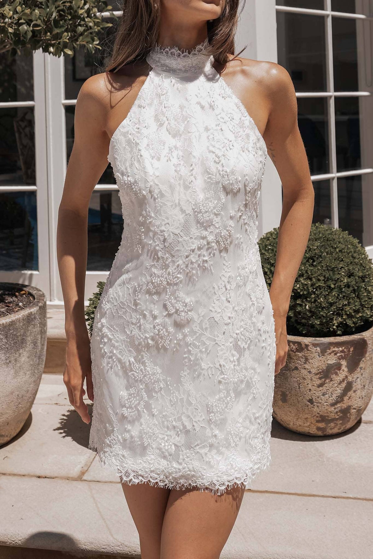 ADELE ivory beaded lace mini wedding dress featuring a high halter neckline, delicate lace trim and relaxed fit