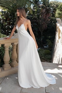 Side image of ROSITA ivory elopement wedding dress featuring a lace-trimmed V-neckline, spaghetti straps and flowing A-line silhouette and short train