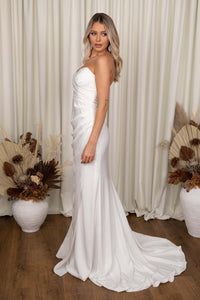 Side Image of Ivory White Fit and Flare Wedding Gown with Sweetheart Strapless Bodice and Gathered Draping Detail