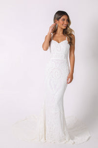White embroidered pattern sequin gown with sweetheart neckline and thin shoulder straps