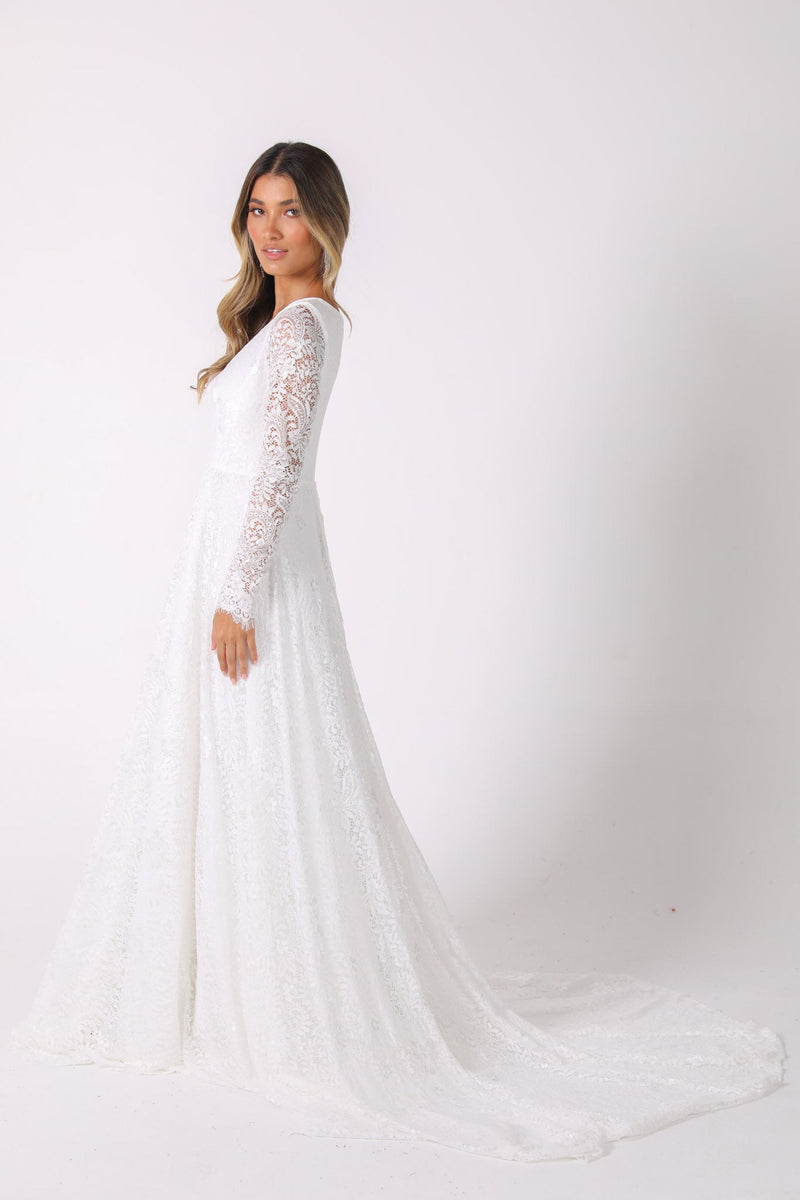 long sleeve lace white dress Like An Angel Feel the magic of side seam pockets Elegant Lace Wedding Dresses for