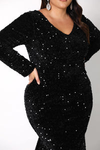 Close up image of Black Winter Evening Formal Long Sleeve Sequinned Velvet Gown with V Neckline and Fit & Flare Mermaid Silhouette