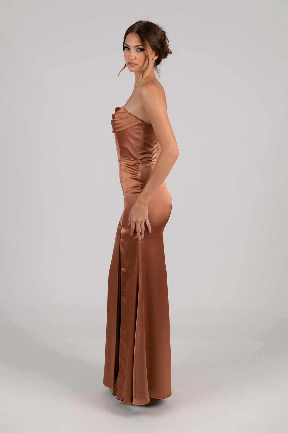 Side Image of Burnt Orange Brown Rust Coloured Strapless Satin Maxi Dress with Draped Bust Detail and Side Slit